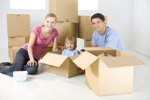 Professional removal services in Farringdon with moving team and boxes