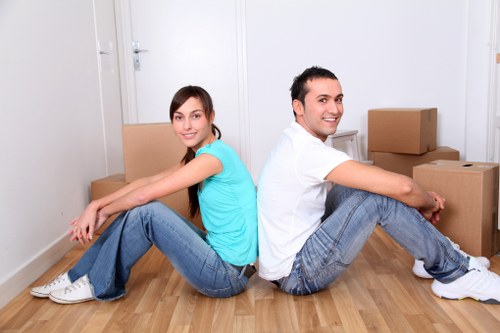 Professional removal team handling furniture in Farringdon