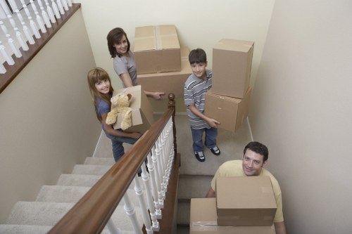 Professional movers loading boxes during an urgent relocation in Farringdon